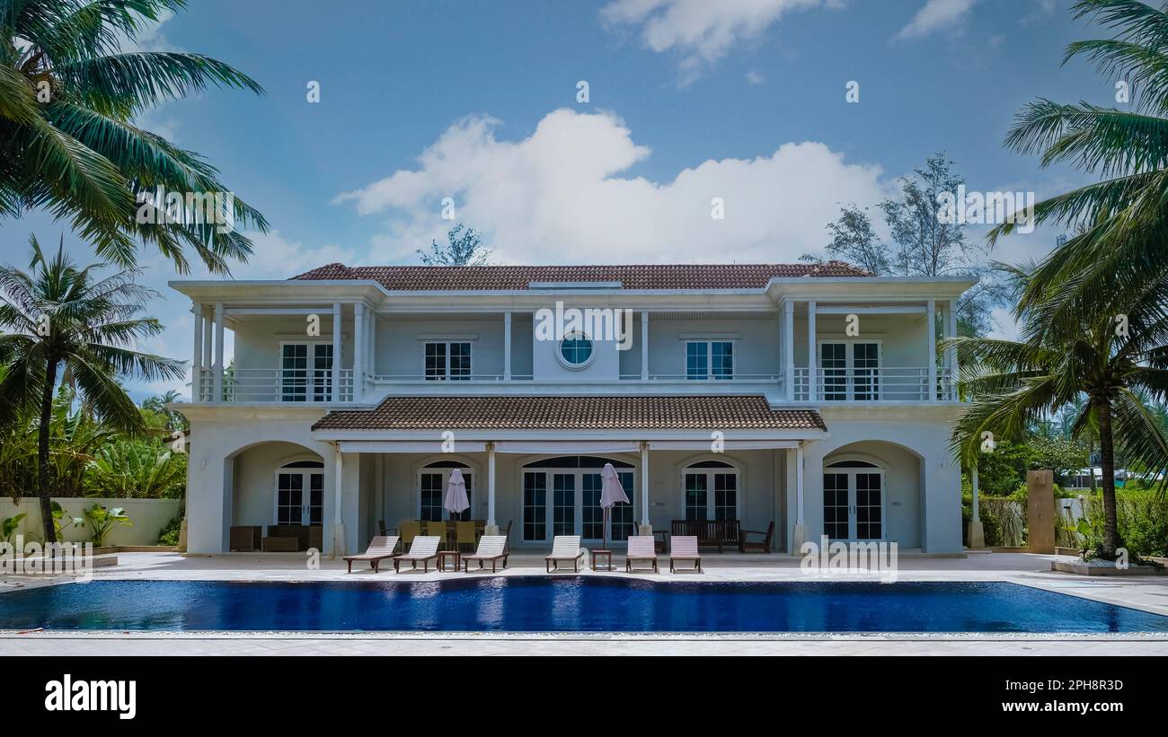 Modern house with a swimming pool, modern pool villa at the beach ...
