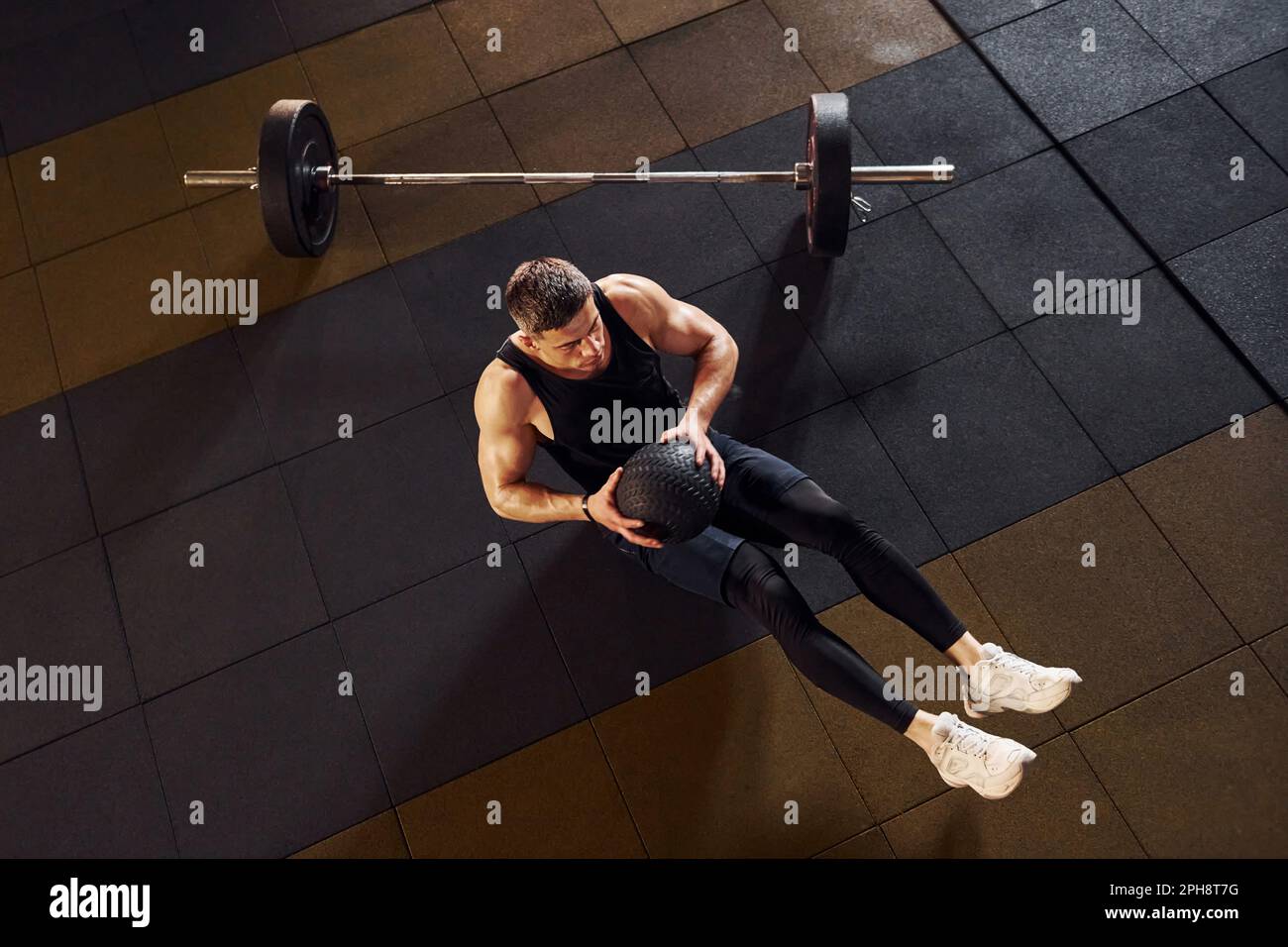 Top view of strong man in sportive clothes that have workout day in the ...