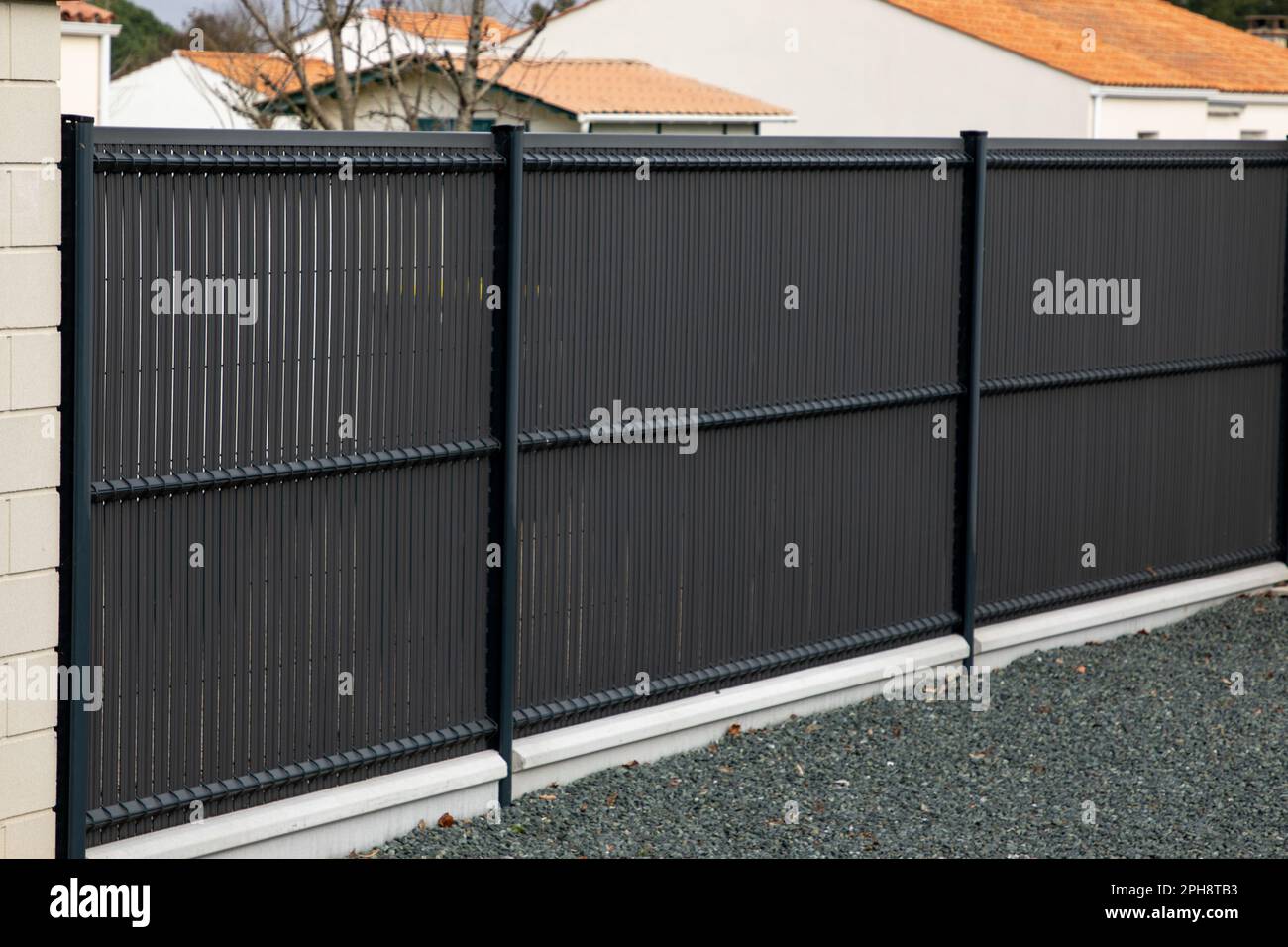 wall dark grey aluminum barrier and gray fence of private individual