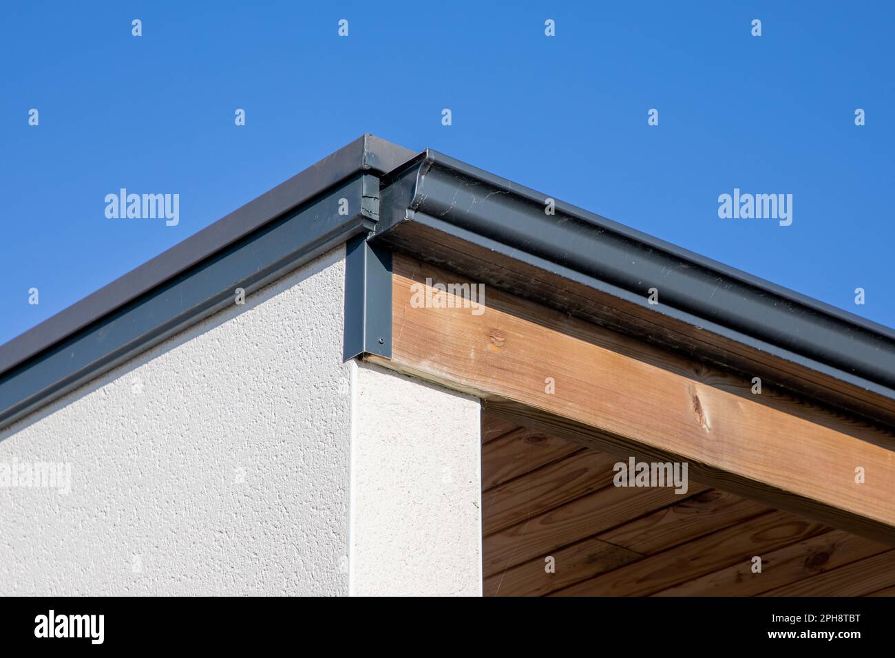 House rain grey gutter waterproofing home corner roof facade Stock Photo Alamy