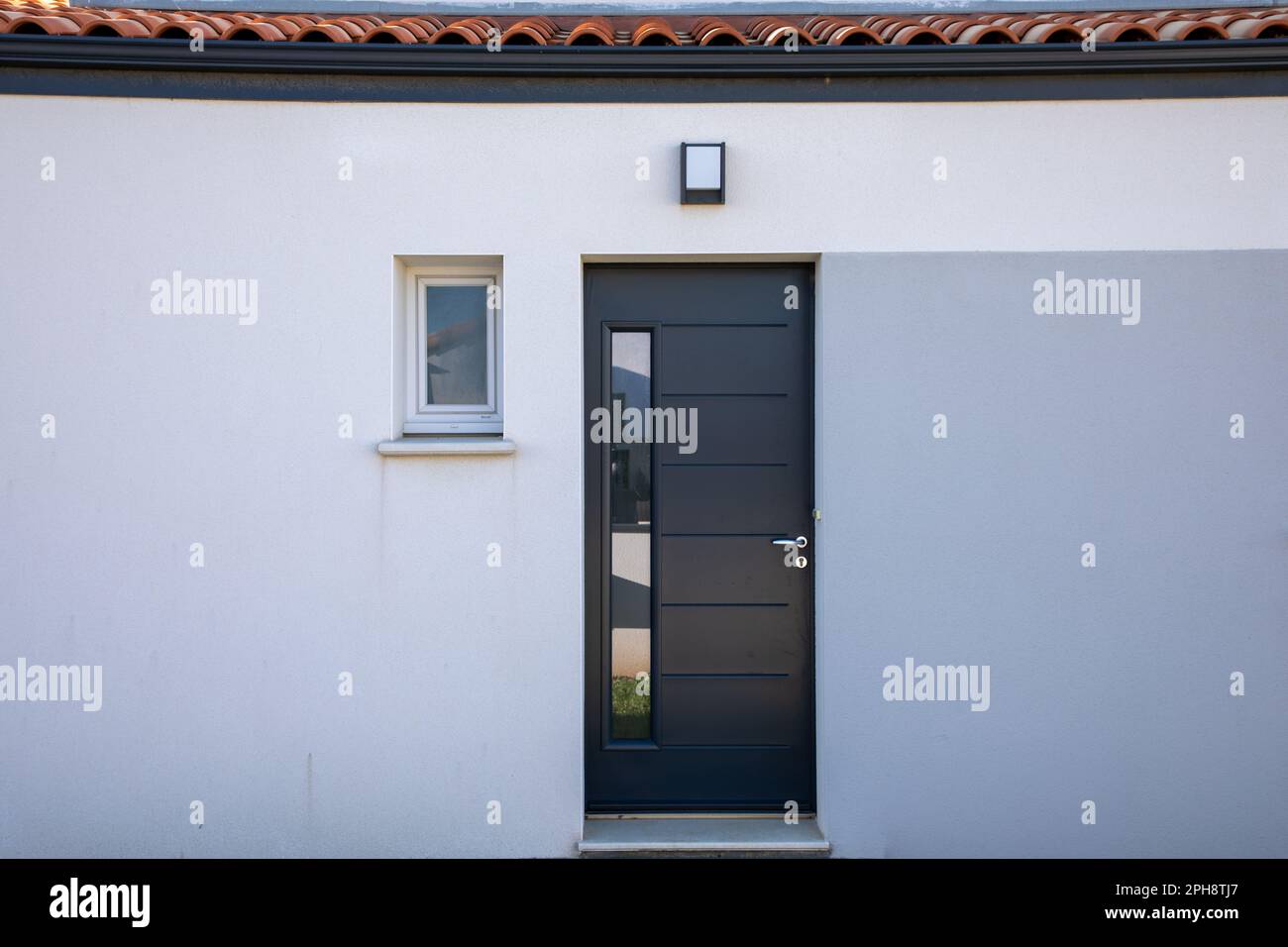 modern white house with grey facade door of suburb home entrance Stock ...