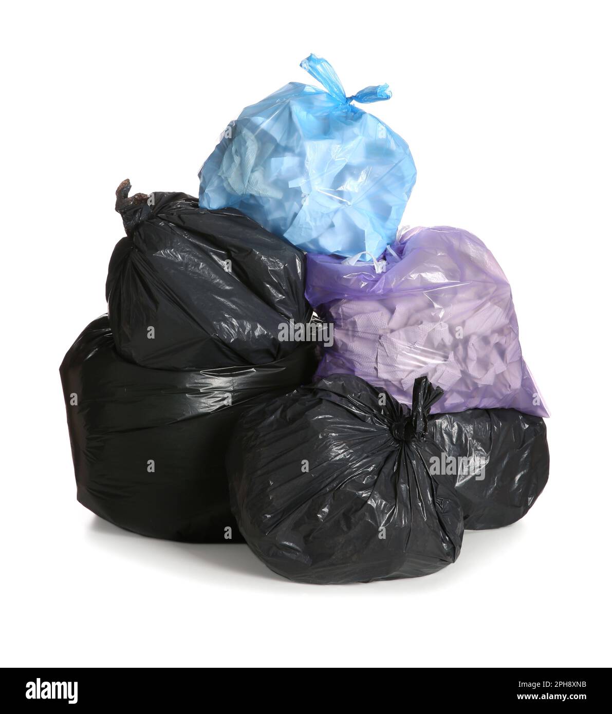 Trash bags full of garbage on white background Stock Photo