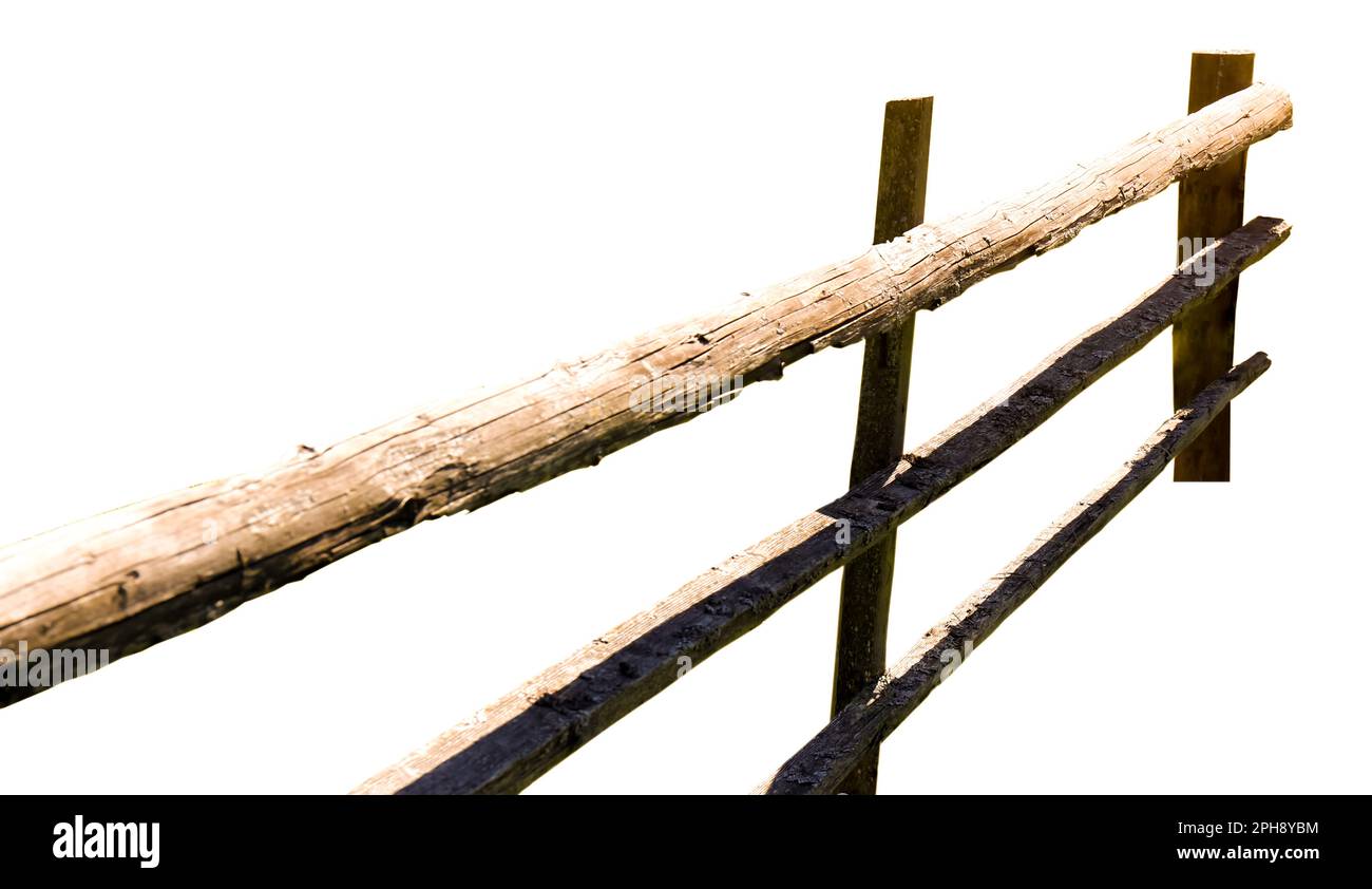 Wooden fence made of old timber isolated on white, closeup Stock Photo