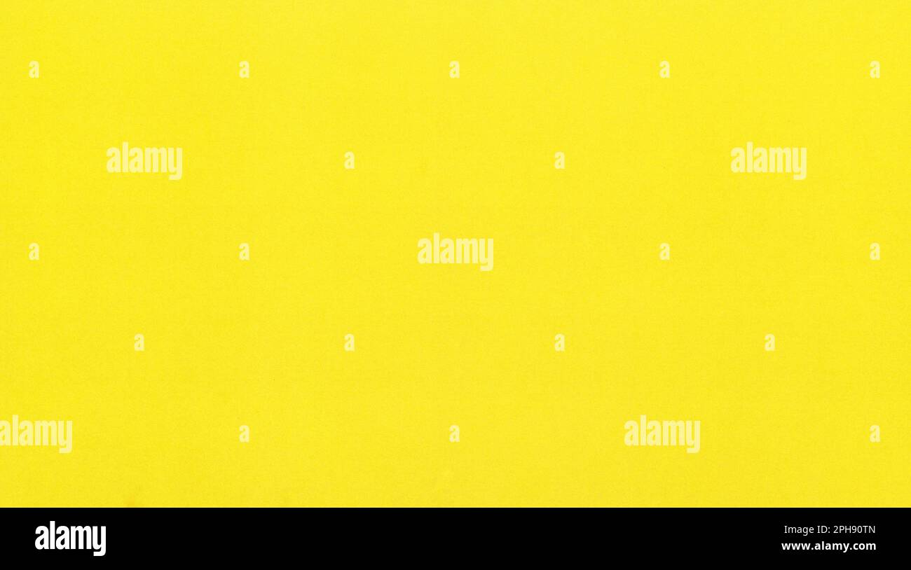 yellow paper texture useful as a background Stock Photo