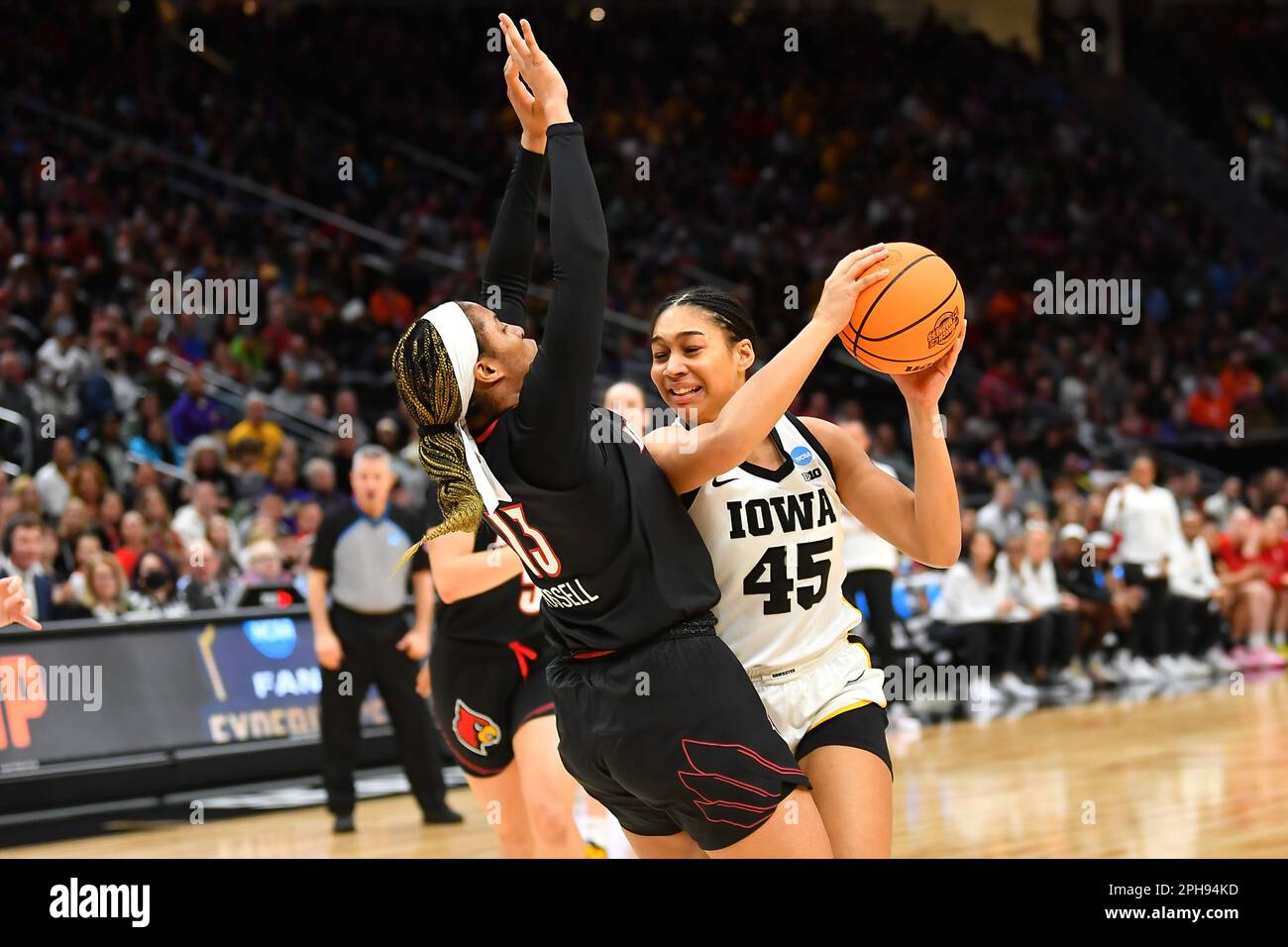 March 26, 2023: Iowa Hawkeyes forward Hannah Stuelke (45) works inside against Louisville Cardinals guard Merissah Russell (13) during the NCAA women's NCAA Regional Final basketball game between Louisville and Iowa at Climate Pledge Arena in Seattle, WA. Iowa defeated Louisville 97-83 to advance to the Final 4. Steve Faber/CSM Stock Photo