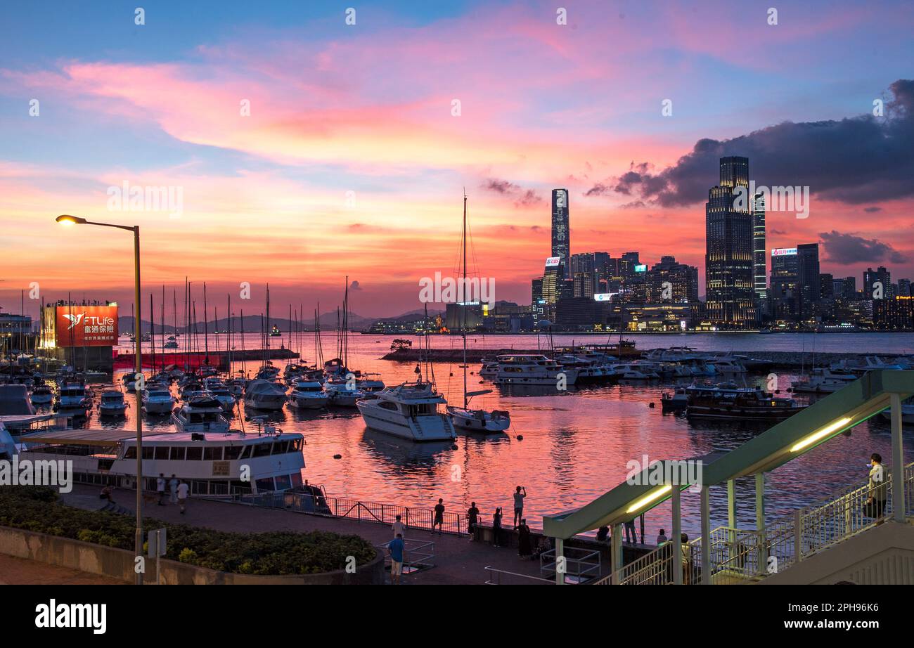 View of Causeway Bay Typhoon Shelter and Tsim Sha Tsui city skyline at