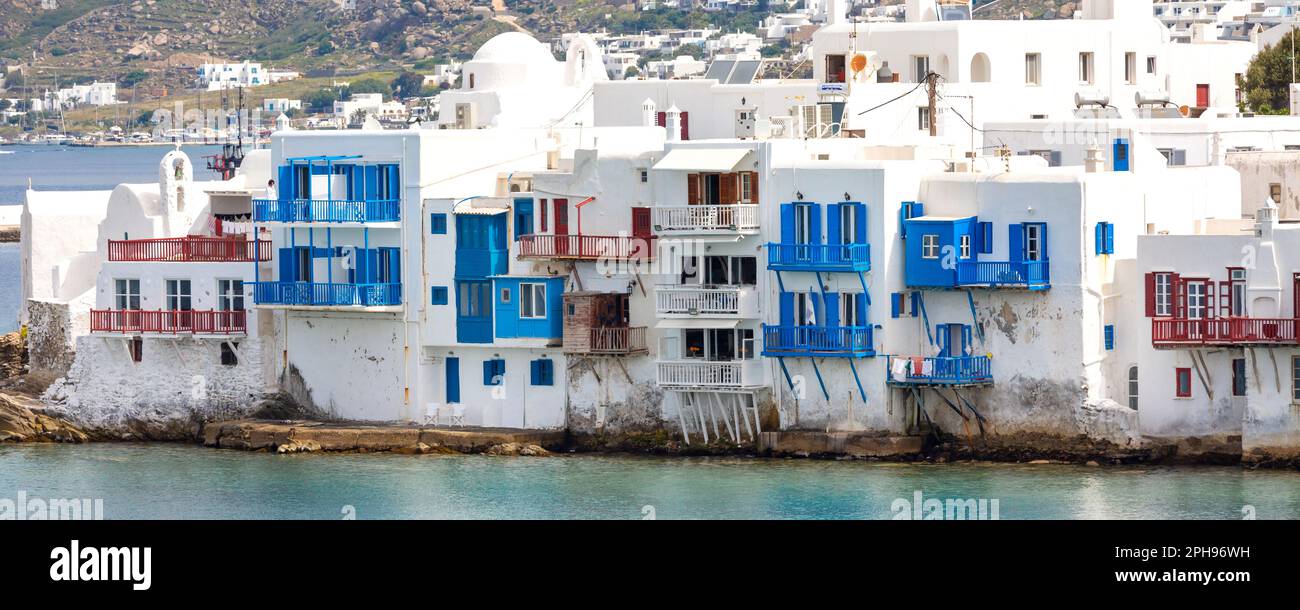 Mykonos, Greece banner panorama of Little Venice white traditional houses aerial view Stock Photo