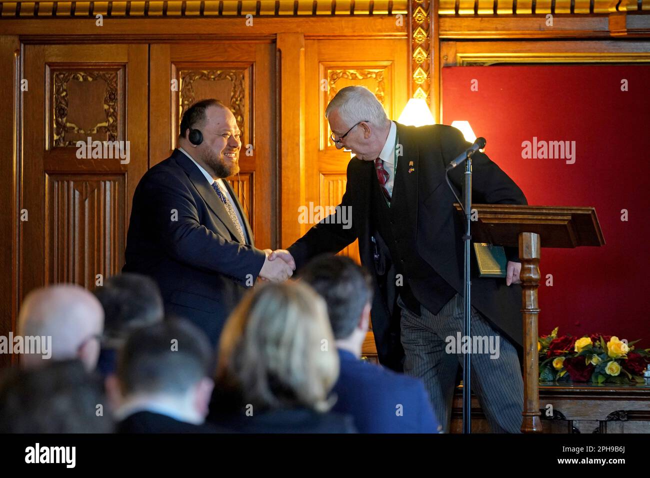 Speaker of the House of Commons Sir Lindsay Hoyle (right) shakes the ...