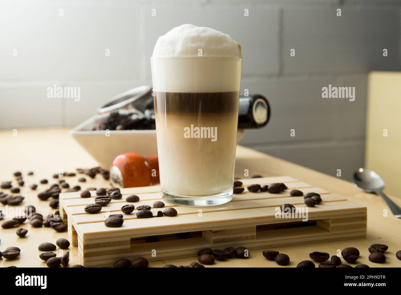 Barista preparing a delicious organic coffee. Cafe Latte. Latte machiatto  Stock Photo - Alamy