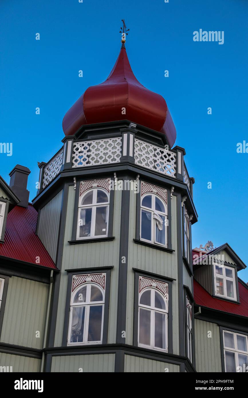 Traditional Icelandic house home with red dome steeple in downtown