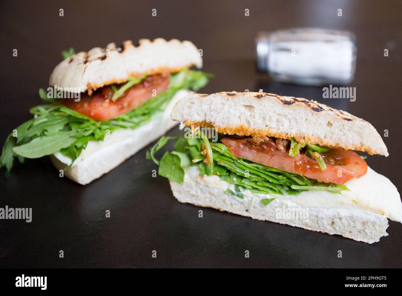 Delicious vegan sandwich with different vegetables. Stock Photo