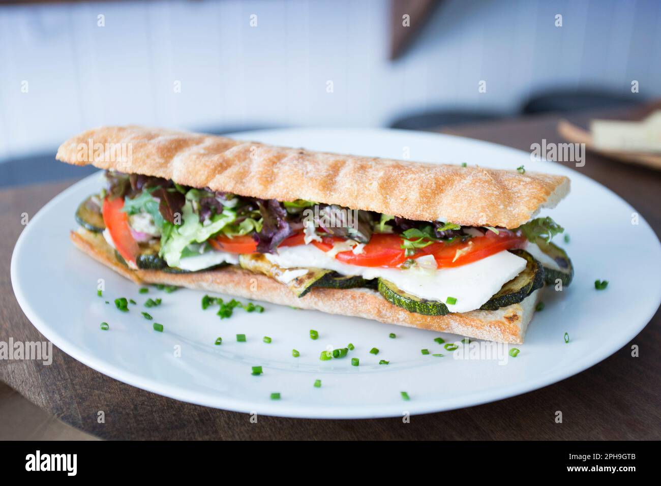 Delicious vegan sandwich with different vegetables. Stock Photo