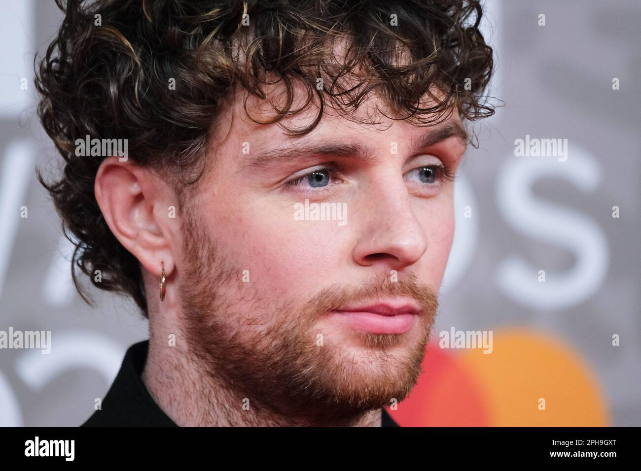 Tom Grennan photographed attending The BRITS Red Carpet Arrivals at The