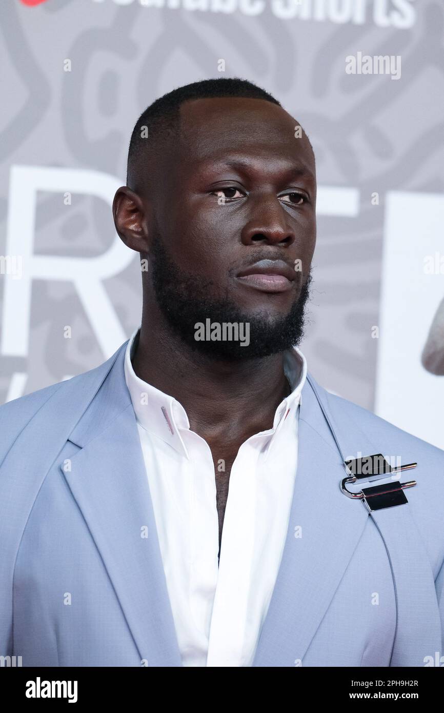 Stormzy photographed attending The BRITS Red Carpet Arrivals at The O2 in London, UK on 11 February 2023 . Picture by Julie Edwards. Stock Photo