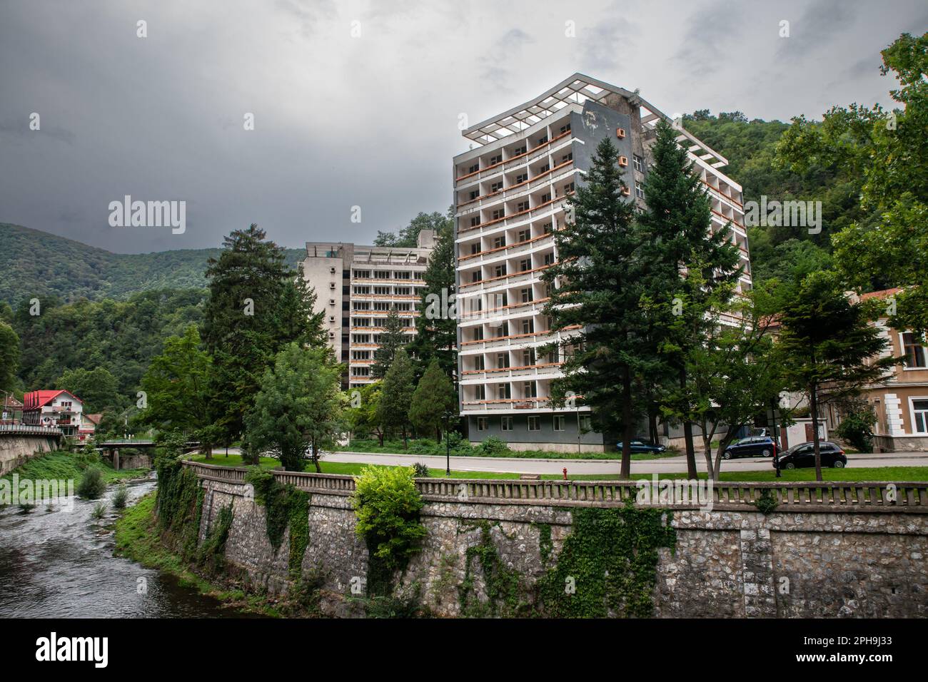 Picture of an abandoned hotel in baile Herculane. it's a socialist architecture resort in the city of baile herculane. Băile Herculane is a spa town i Stock Photo