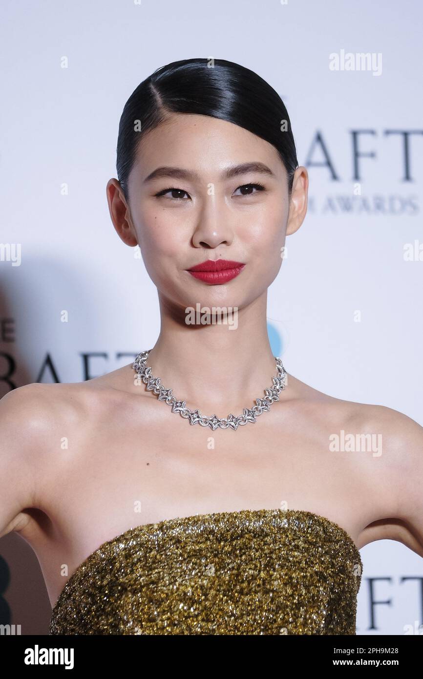 Hoyeon Jung photographed during The 2023 EE BAFTA Film Awards Red Carpet  Arrivals at The Royal Festival Hall in London, UK on 19 February 2023 .  Picture by Julie Edwards Stock Photo - Alamy