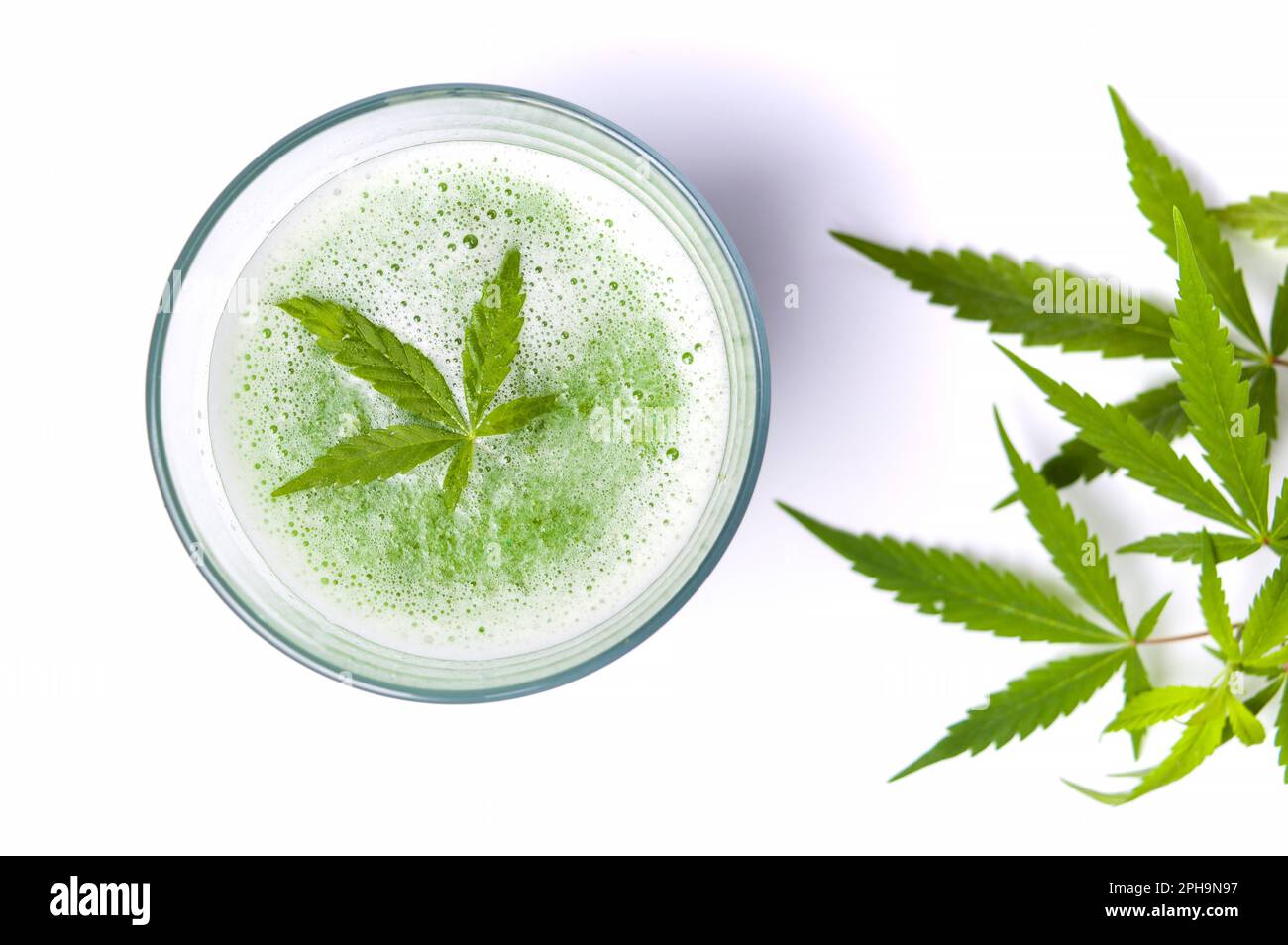 Green marijuana smoothie juice on white background Stock Photo