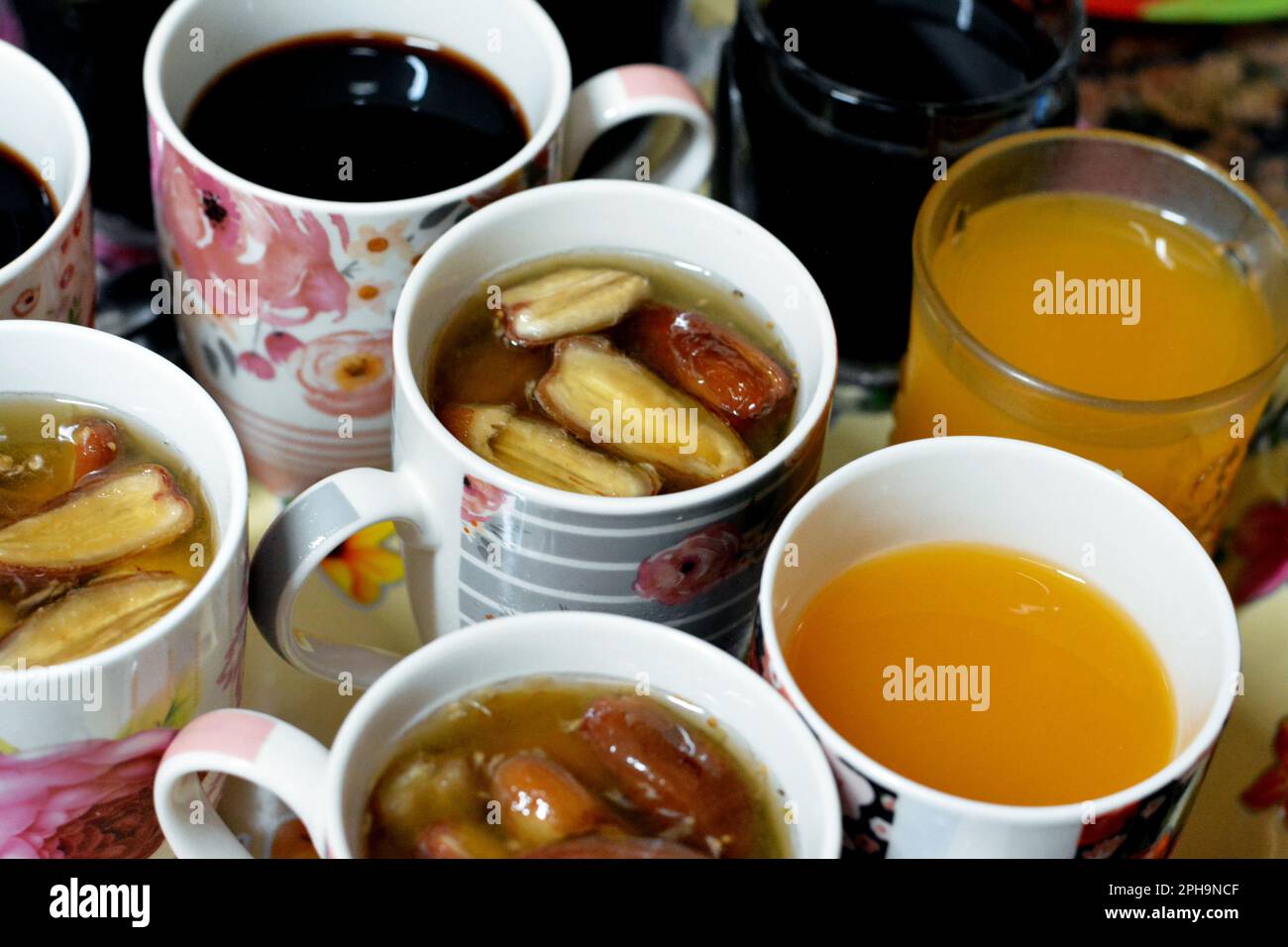 Juices, drinks and compotes tray on the iftar table in Ramadan month