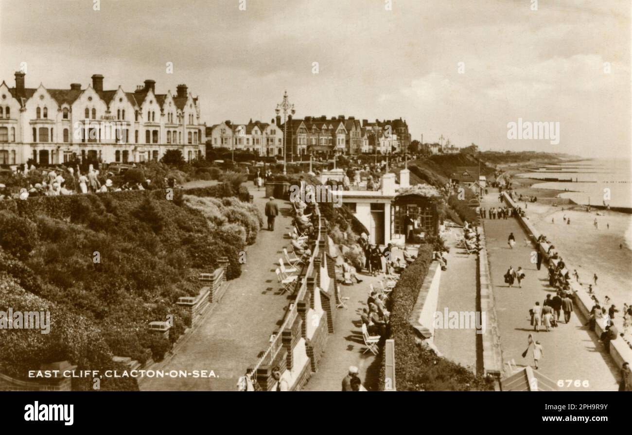 Essex, England. Circa. 1950s. A vintage postcard entitled “East Cliff, Clacton-on-Sea”.  Depicting visitors and holidaymakers on East Cliff promenade. Stock Photo