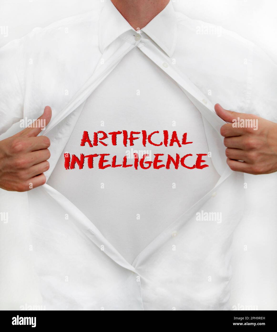 Man opens his shirt to reveal AI - Artificial Intelligence - written on it Stock Photo