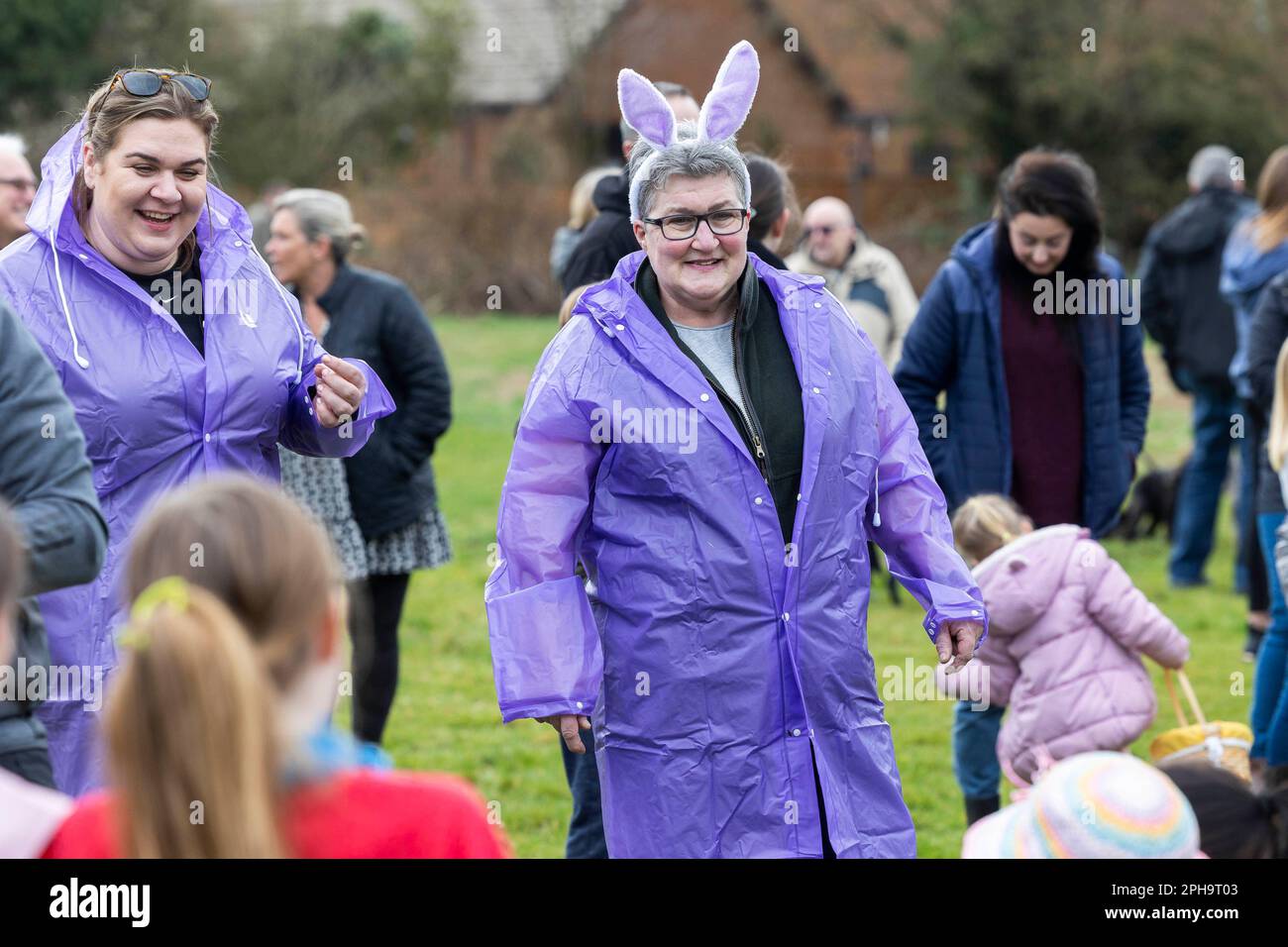 EDITORIAL USE ONLY Locals collect easter eggs gifted from Cadbury to