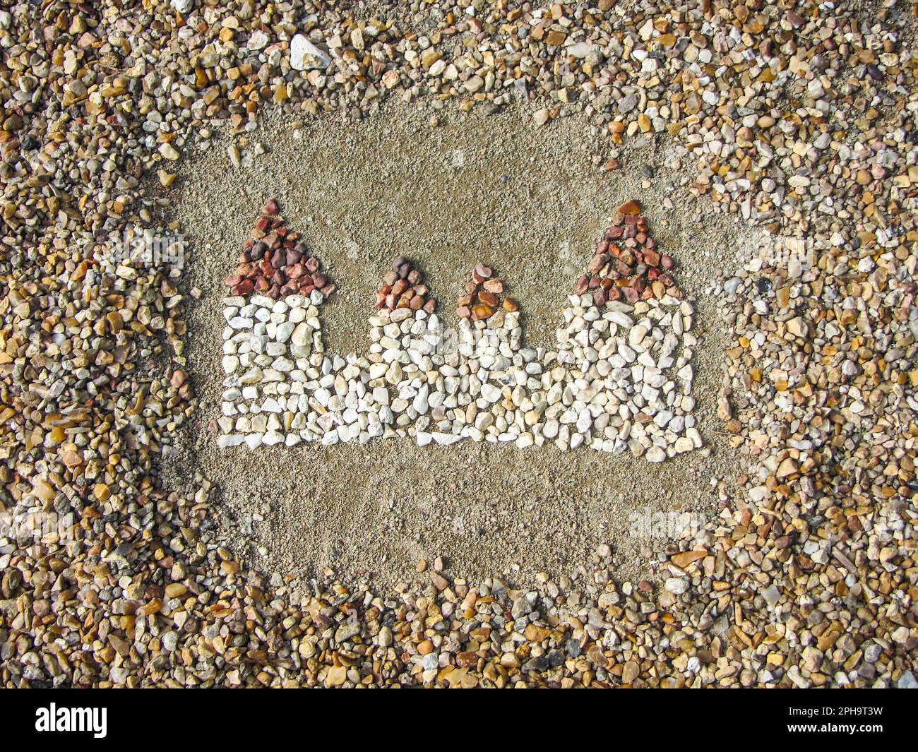 A little castle made out of little stones, art, daylight Stock Photo