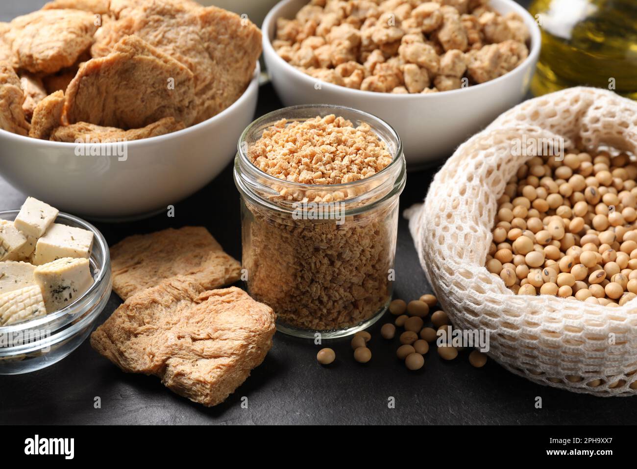 Different organic soy products on black table Stock Photo Alamy