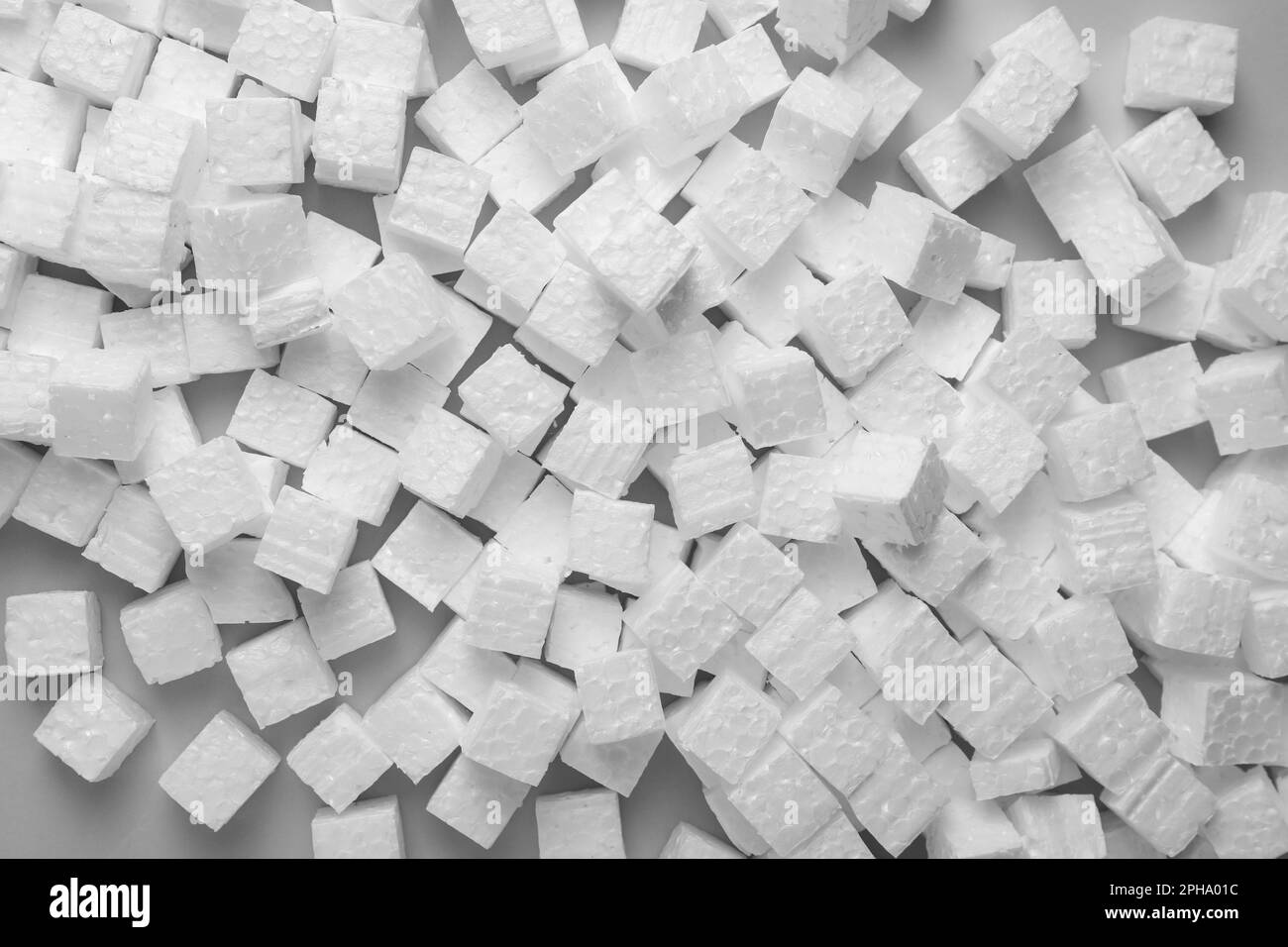 Many styrofoam cubes on grey background, flat lay Stock Photo
