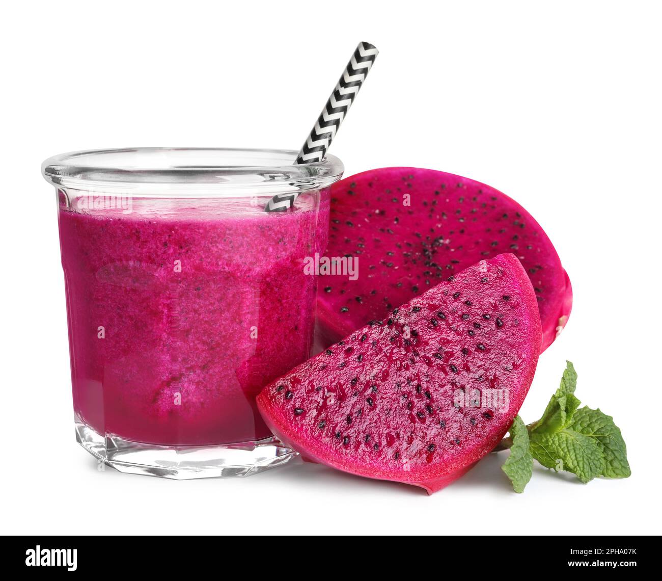 Glass of tasty pitahaya smoothie, dragon fruit and fresh mint on white ...