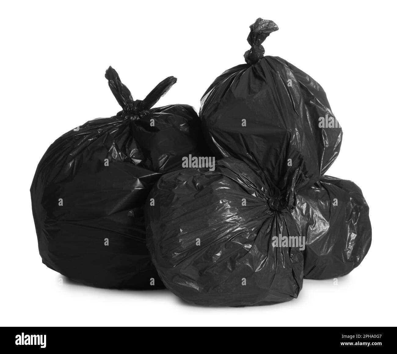 Black trash bags full of garbage on white background Stock Photo Alamy