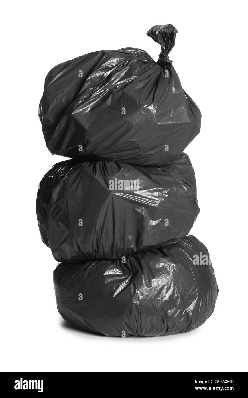 Black plastic bags filled with garbage Cut Out Stock Images & Pictures