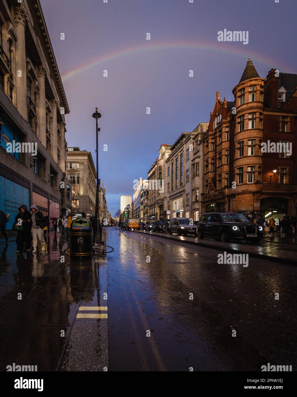 A rainbow appears over central London after a downpour. Stock Photo