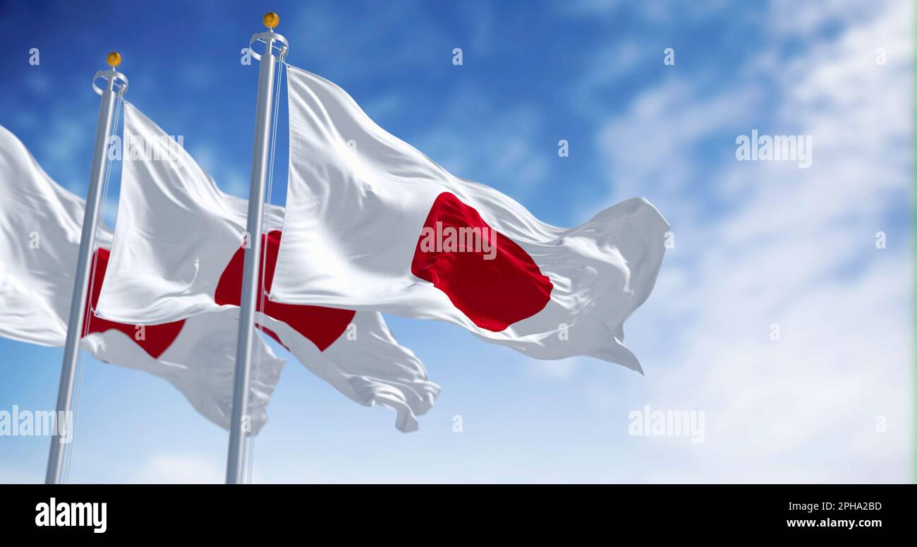 Three Japan national flags waving in the wind on a clear day. Red disc on a white field. Japan is an island country in East Asia. 3D illustration rend Stock Photo