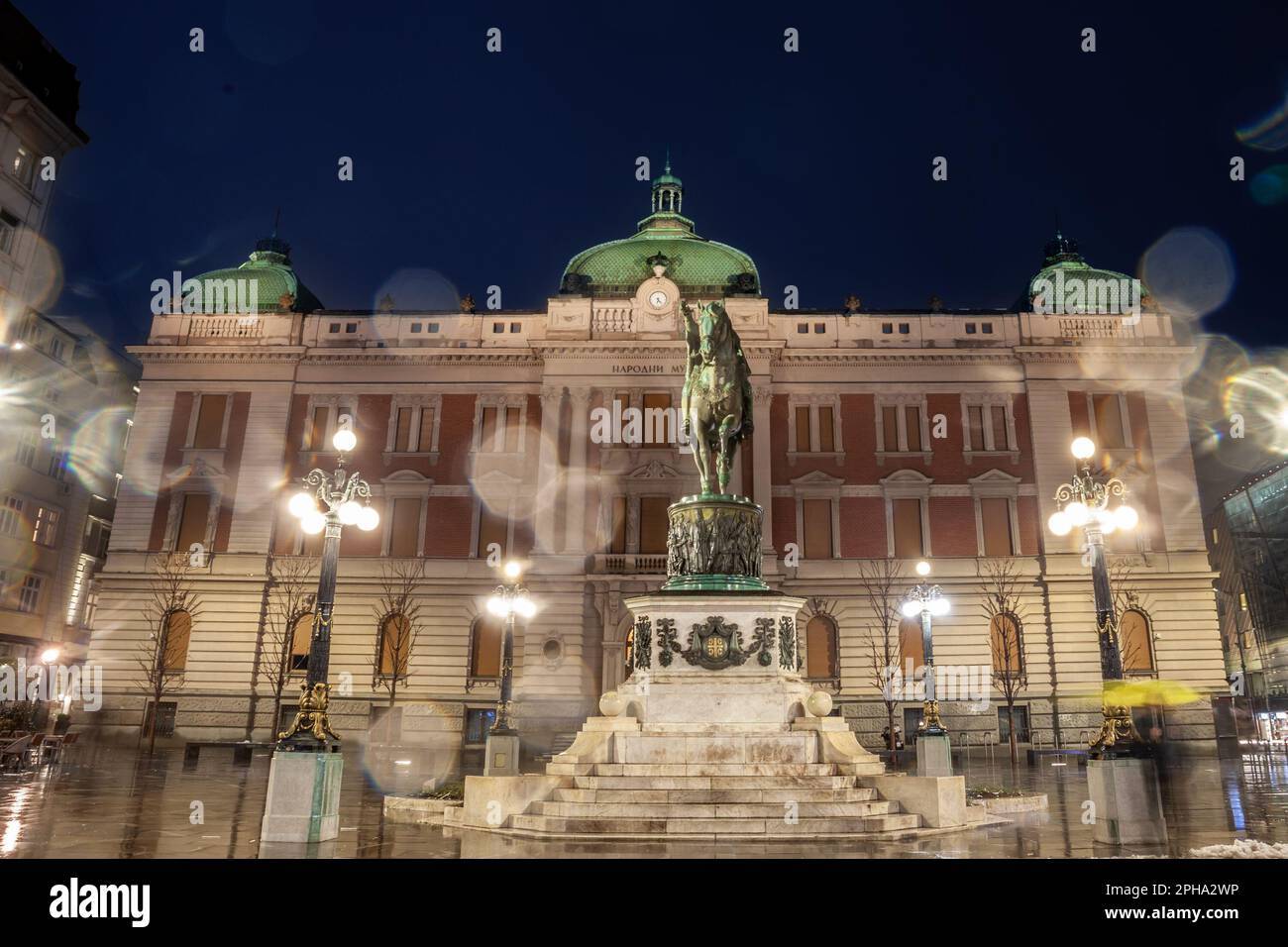Picture of the national museum of Serbia in belgrade with the statue of Prince Mihailo in front, on Trg Republike, also called republic square at nigh Stock Photo