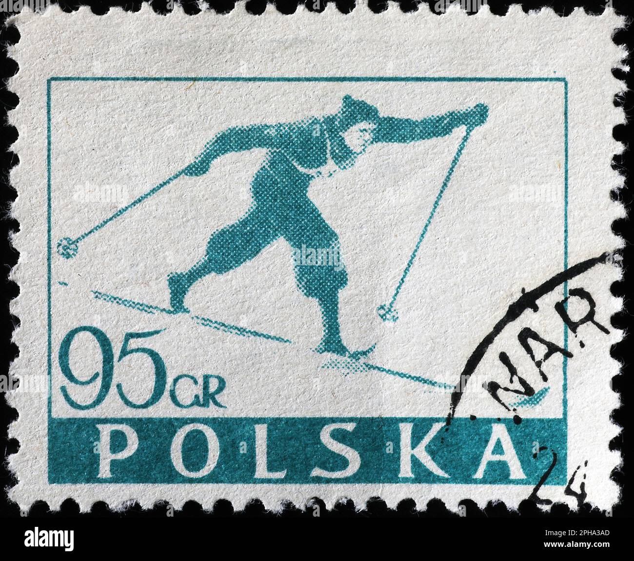 Cross-country ski racer on old polish postage stamp Stock Photo