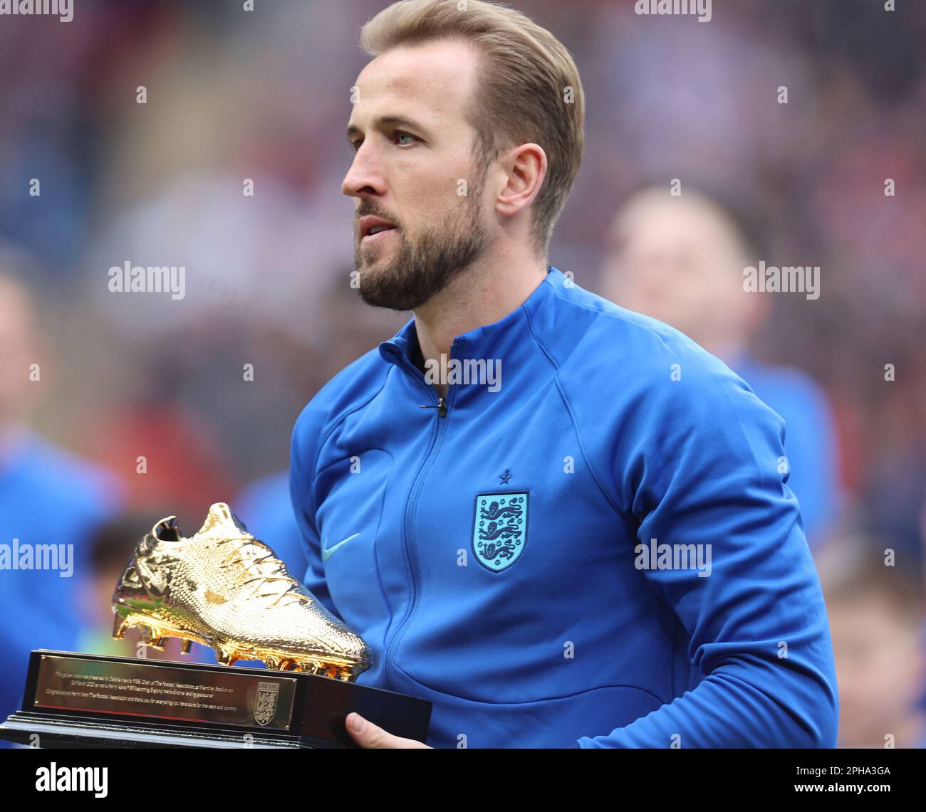 Harry Kane of England poses with their Golden Boot trophy during UEFA