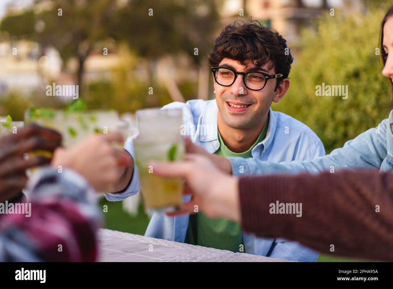 Diverse male friends wearing hi-res stock photography and images - Alamy