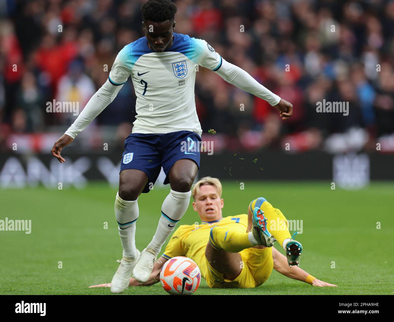 L R Bukayo Saka Arsenal of Englandand Mykhailo Mudryk Chelsea of l-r-bukayo-saka-arsenal-of-englandand-mykhailo-mudryk-chelsea-of