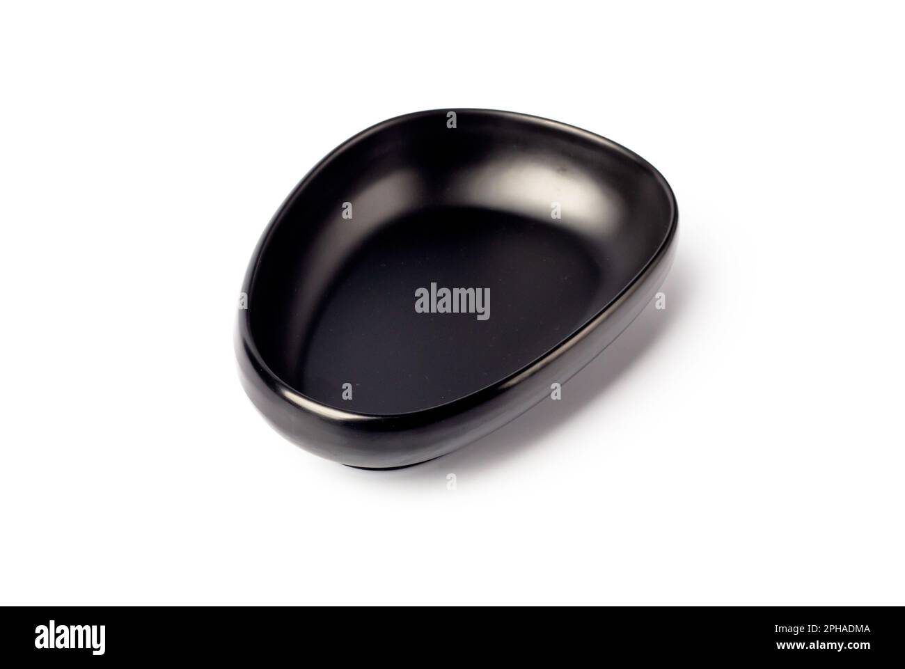 Isolated black ceramic bowl on white background Stock Photo