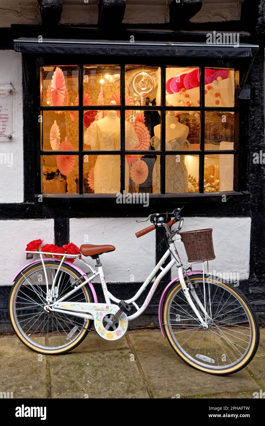 Bike parked in front of a store on Friar Street in Worcester, Worcestershire, England, United Kingdom - 28th of January 2023. Stock Photo