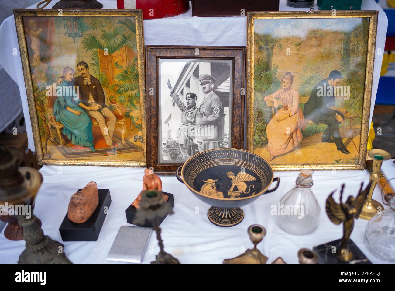 Photograph of Adolf Hitler and Benito Mussolini on sale on a market stall in the still-walled town of Lucca in Tuscany, Italy Stock Photo