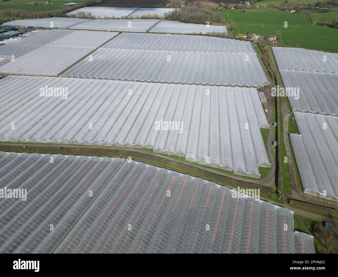 Aerial view of Marden Herefordshire UK showing large soft fruit polytunnels of S&A Produce taken March 2023 Stock Photo