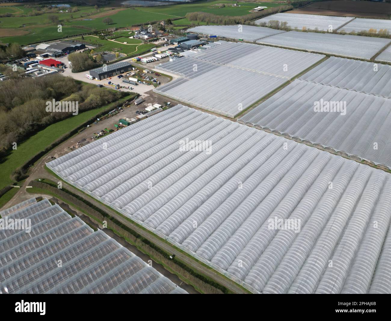 Aerial view of Marden Herefordshire UK showing large soft fruit polytunnels of S&A Produce taken March 2023 Stock Photo