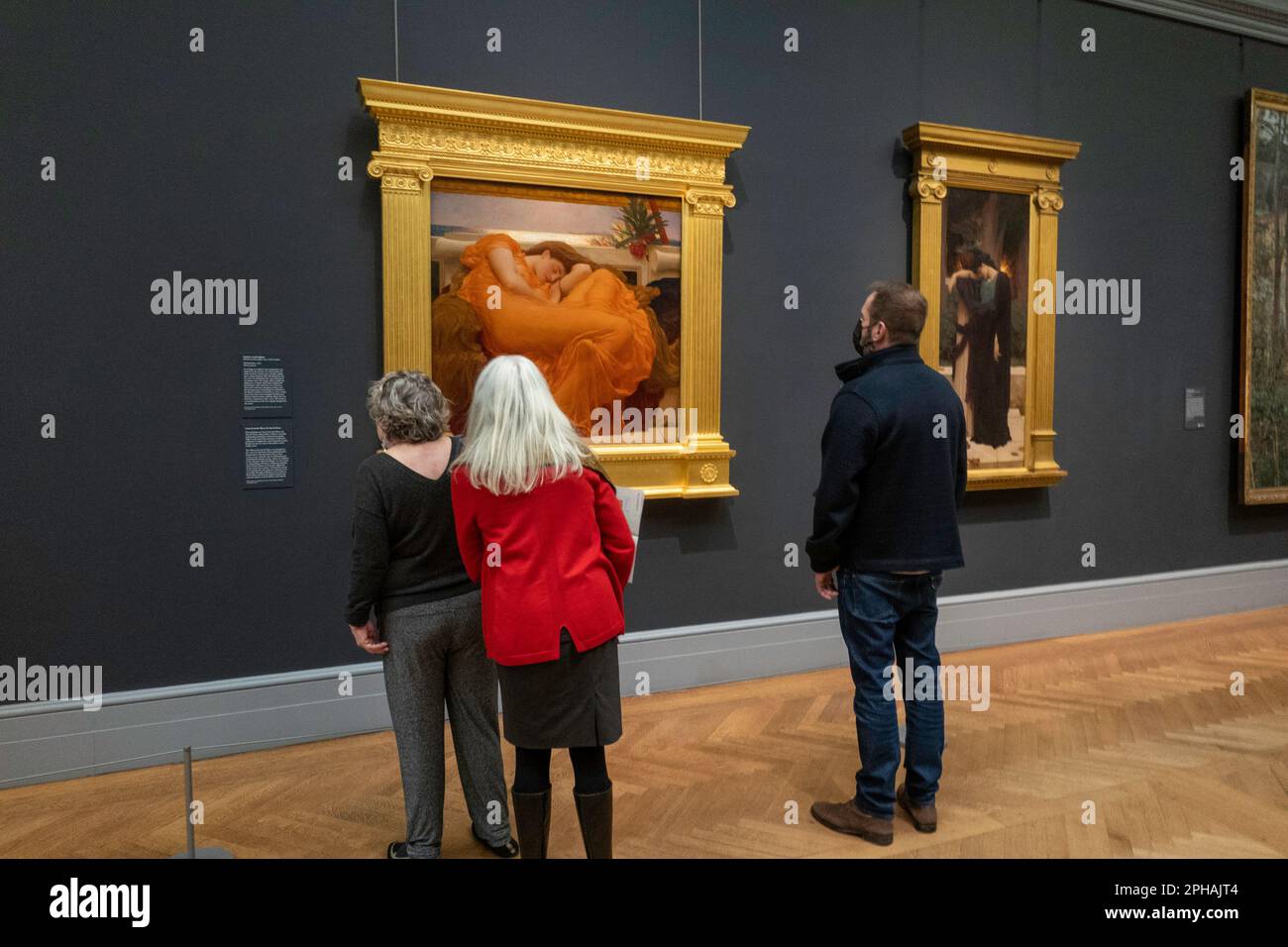 Young and old visitors, appreciate, define artwork at the metropolitan