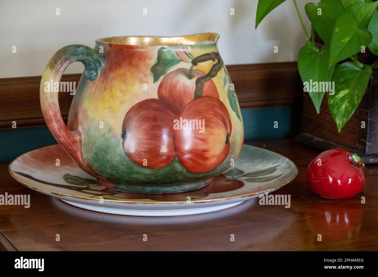 Close-up of an antique 1903 hand painted cider pitcher, USA Stock Photo