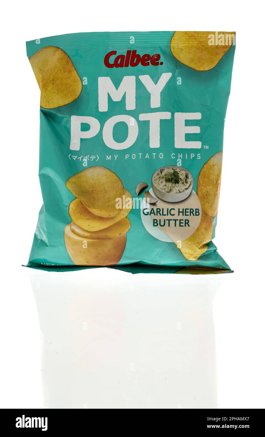 Winneconne, WI - 19 March 2023: A package of Calbee my pote my potato chips on an isolated background. Stock Photo
