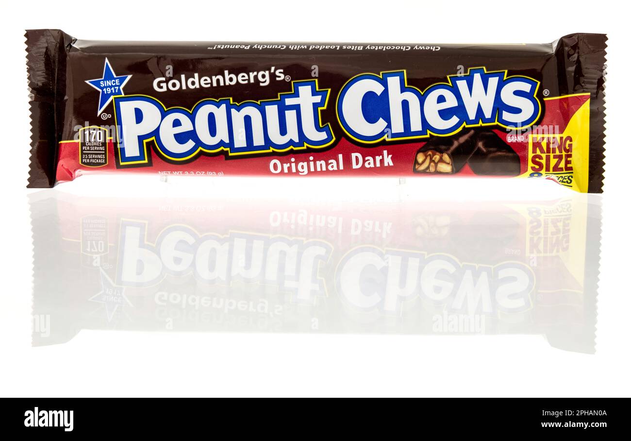 Winneconne, WI - 19 March 2023: A package of Goldenbergs peanut chews candy on an isolated background. Stock Photo