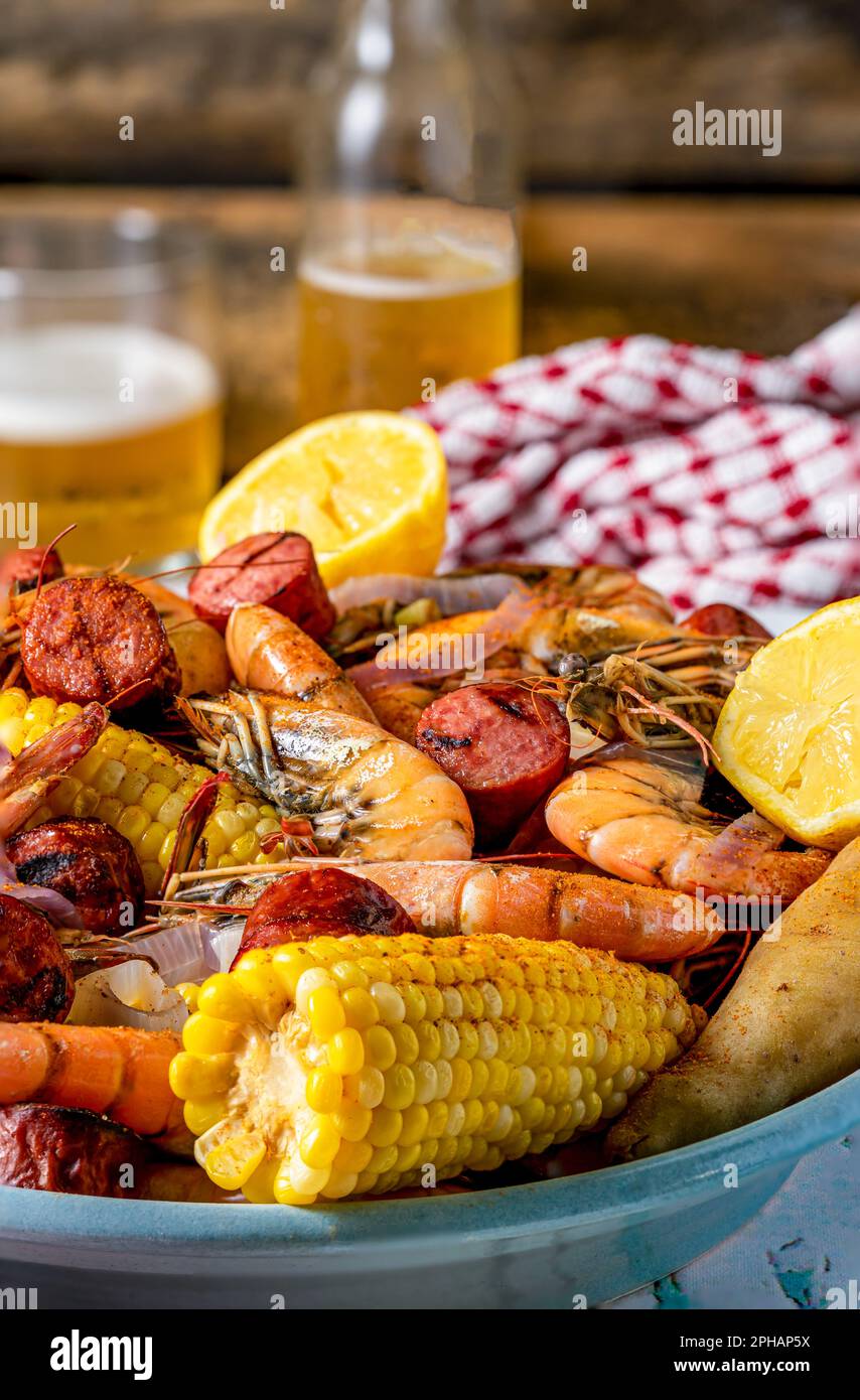Boiled shrimp on a platter Southern US style. Low country boil. Close