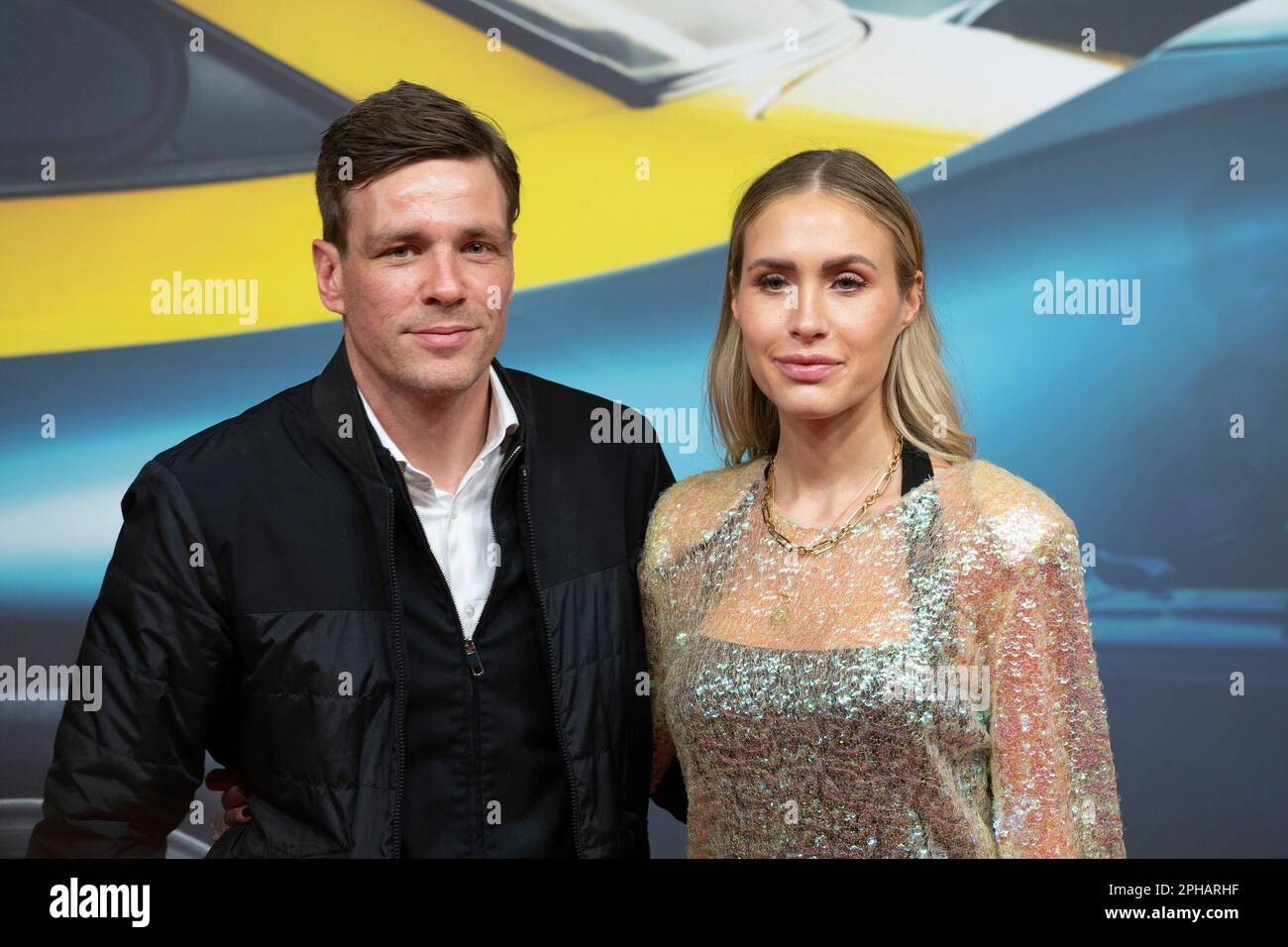 Cologne, Deutschland. 26th Mar, 2023. Clemens FRITZ, soccer player, Alena GERBER, actress, red