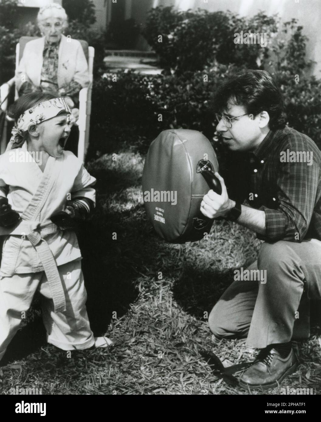 Child actress Ivyann Schwan and actor Rick Moranis in the movie Honey